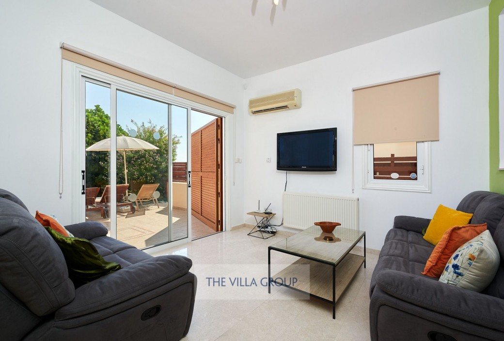 Patio doors lead to the outside terrace