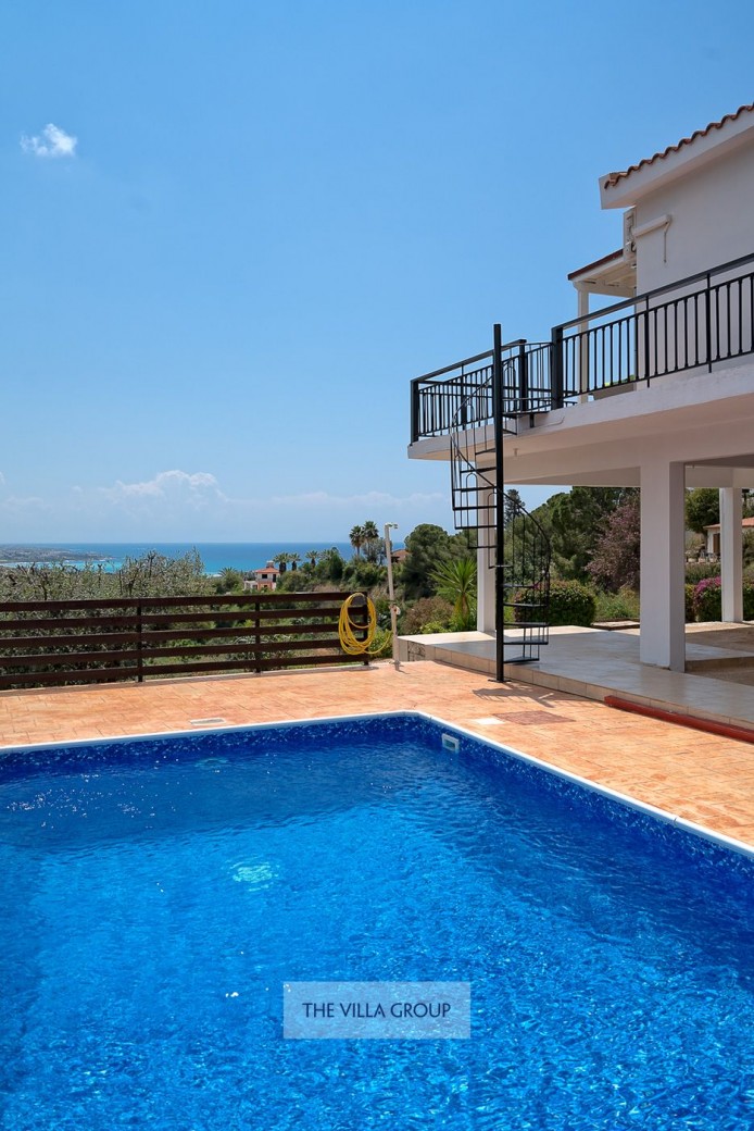 Swimming pool area accessed via the outside spiral staircase