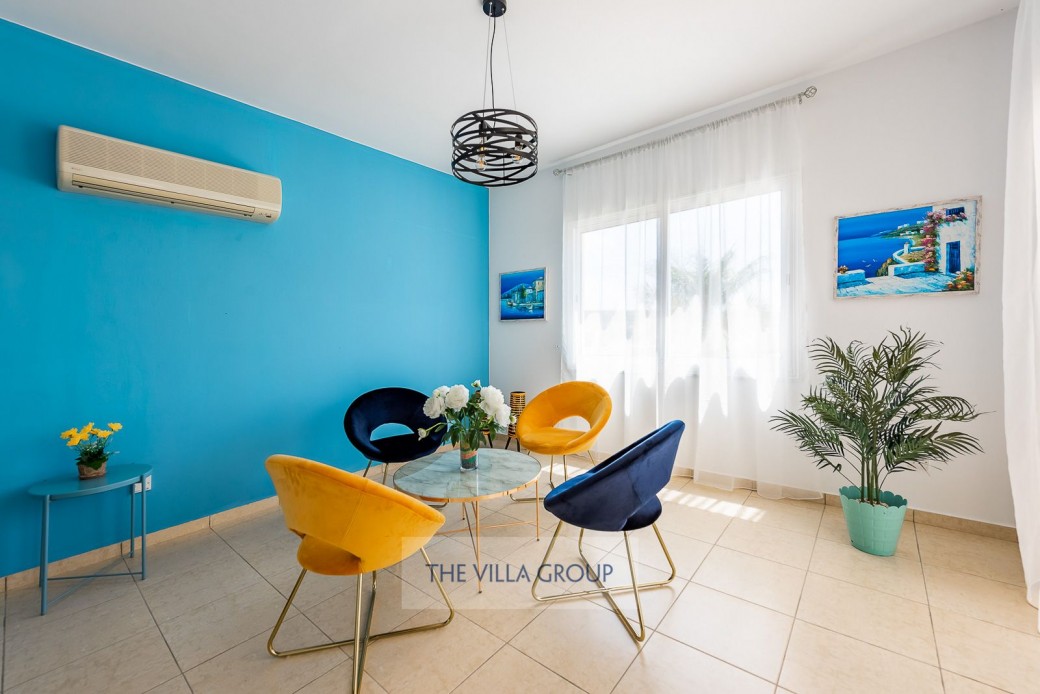 The chic living area features comfortable sofas 
