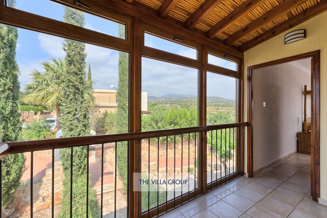 Impressive floor to ceiling glass landing leading to the third bedroom