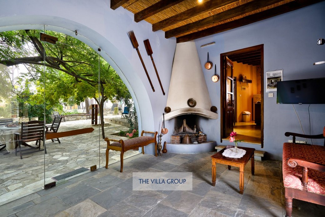 Into the living area you will immediately notice the beautiful courtyard and the abundance of fruit trees 