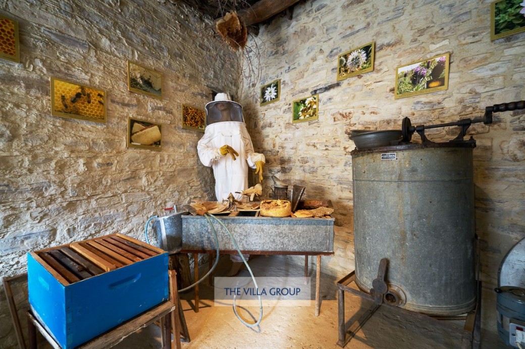A museum room that shows how the local honey is produced