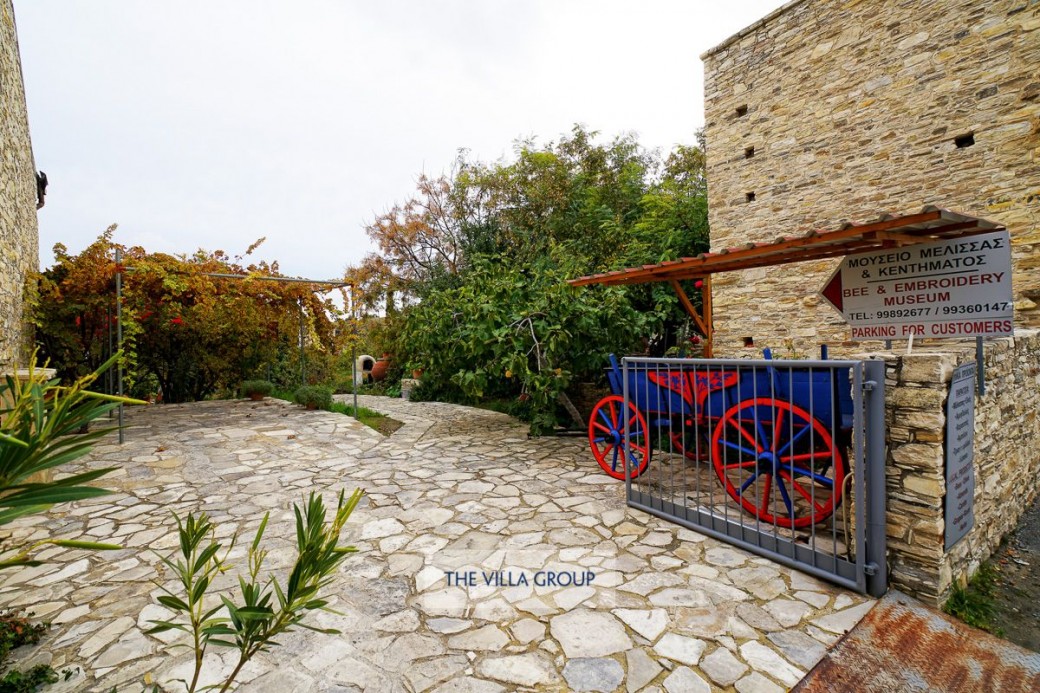 Private parking to the side of the property with traditional horse cart