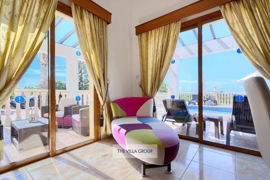 Patio doors from living area lead out to terrace