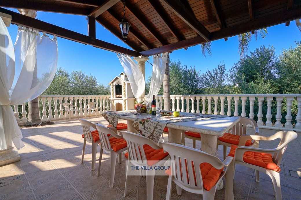 Barbecue and outside furniture makes for ideal al fresco dining