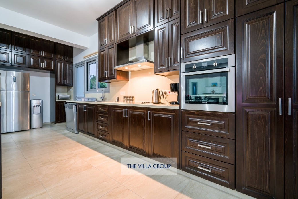 Fully equipped kitchen at each villa