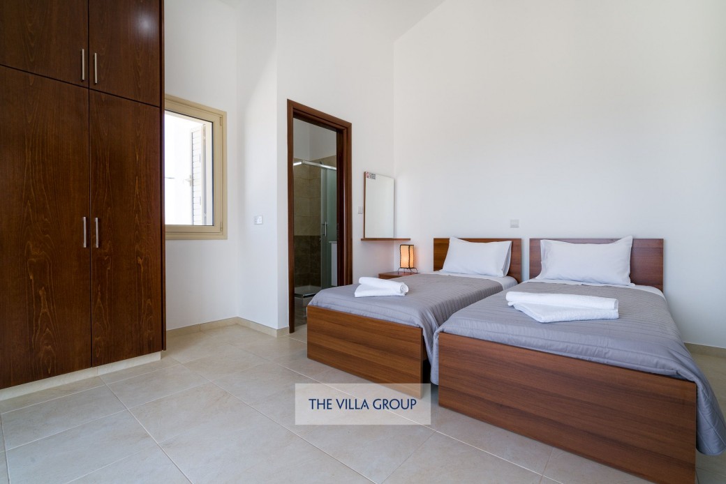 Twin bedroom during the daytime
