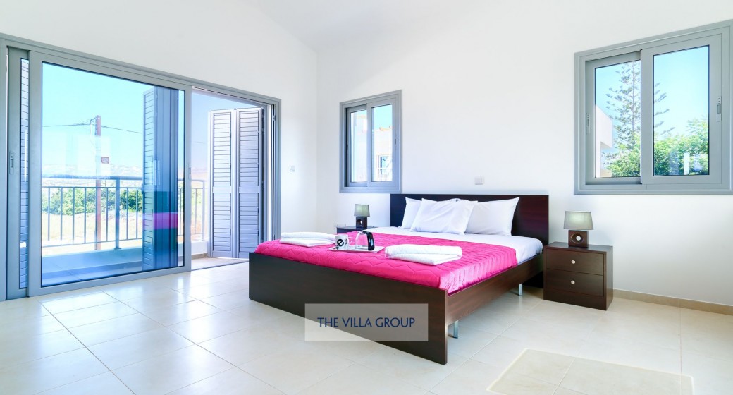 Master bedroom with balcony