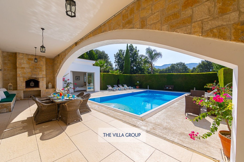 Spacious outside area with plenty of seating areas and sunbeds for relaxing