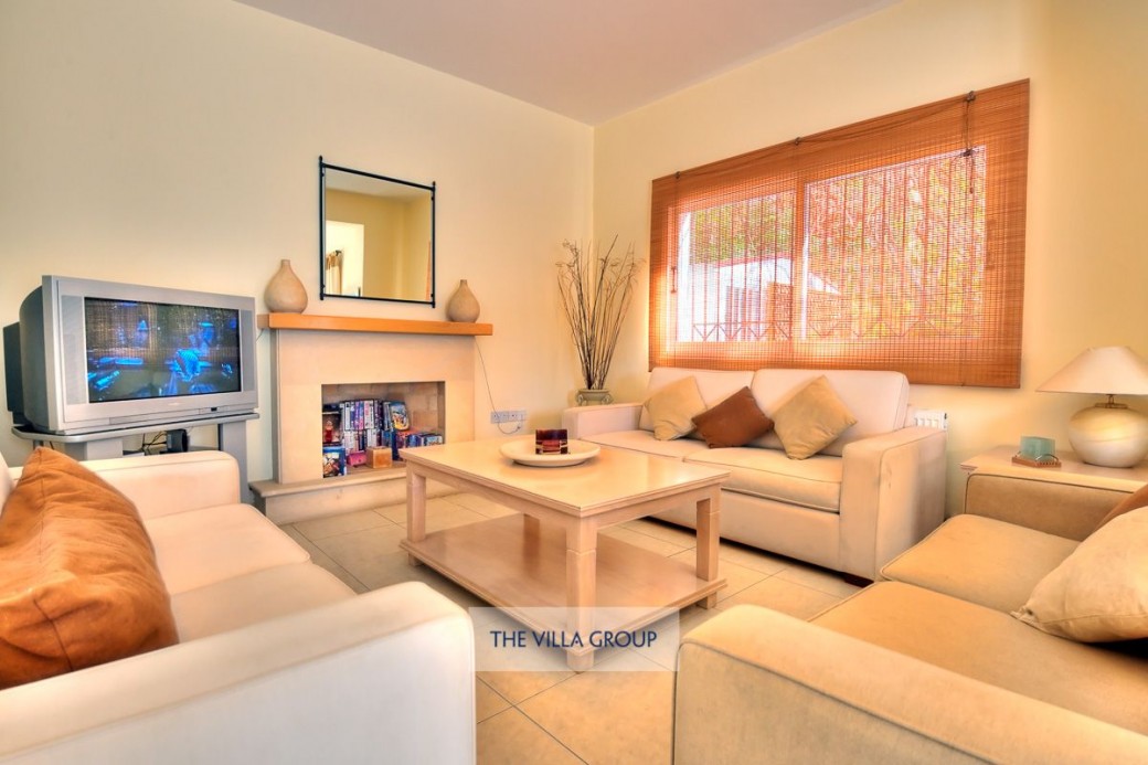 Living area with comfortable sofas and TV