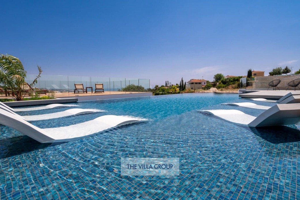 There are sunbeds fixed in the shallow end of the swimming pool where you can relax and cool down