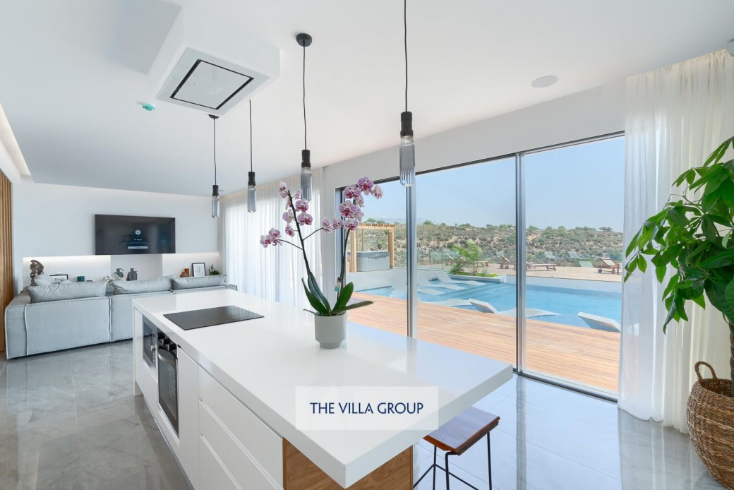Sliding doors lead to the outside terrace