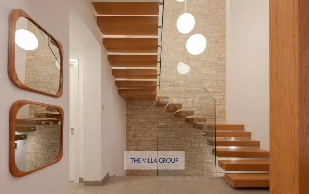 Stairs leading to first floor