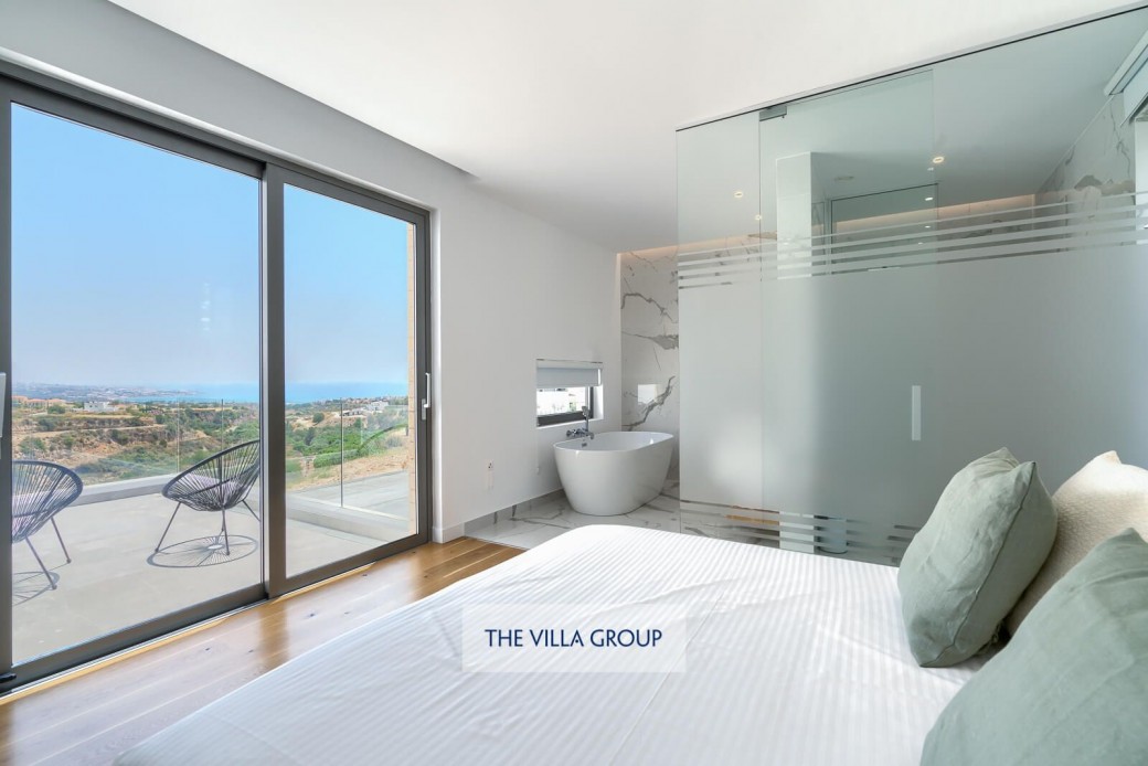 Sliding doors to the furnished balcony