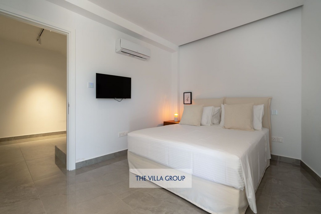 4 bedrooms are located on the lower level; 3 double bedrooms and a twin bedroom, all with en-suite showers