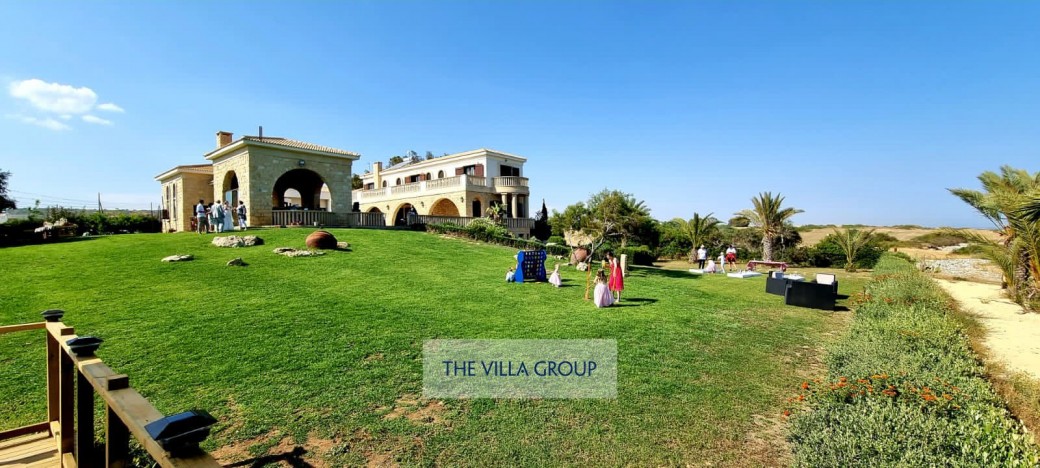 Wedding terrace by the sea with large lawn