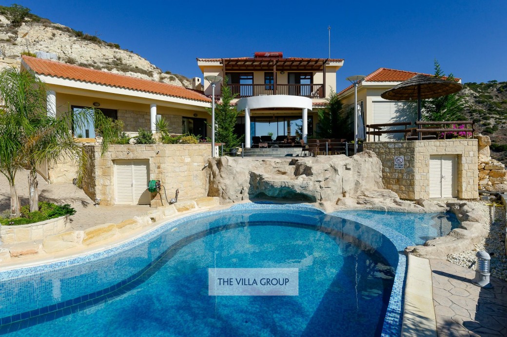 Majestically perched in the hills behind Peyia the villa boasts uninterrupted views of the sweeping coastline