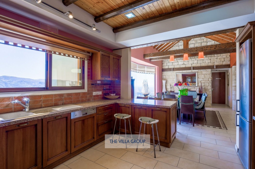 The spacious kitchen is fully equipped