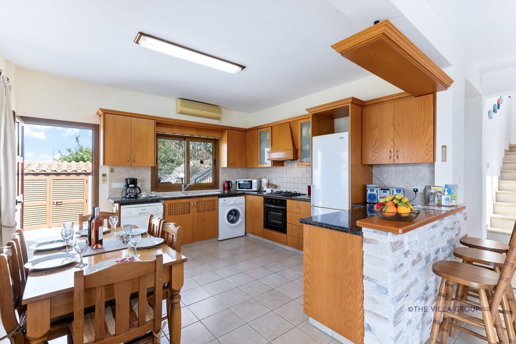Fully fitted kitchen with dining area