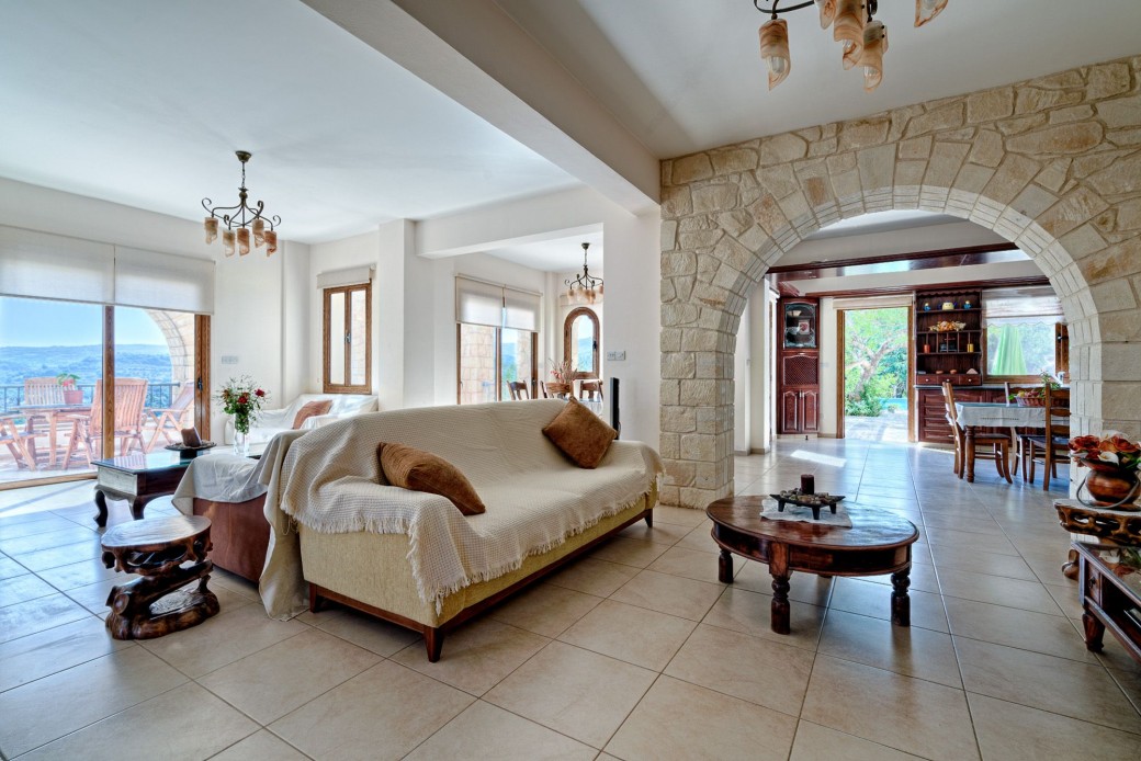 Doors from living area lead to terrace