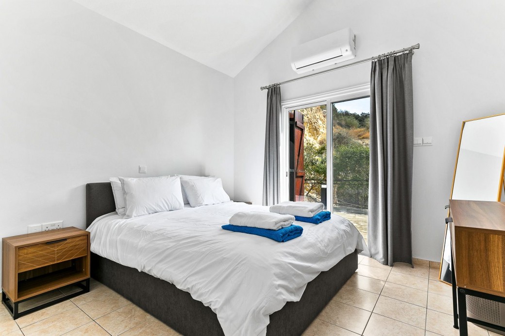 Double bedroom on mezzanine floor with private terrace
