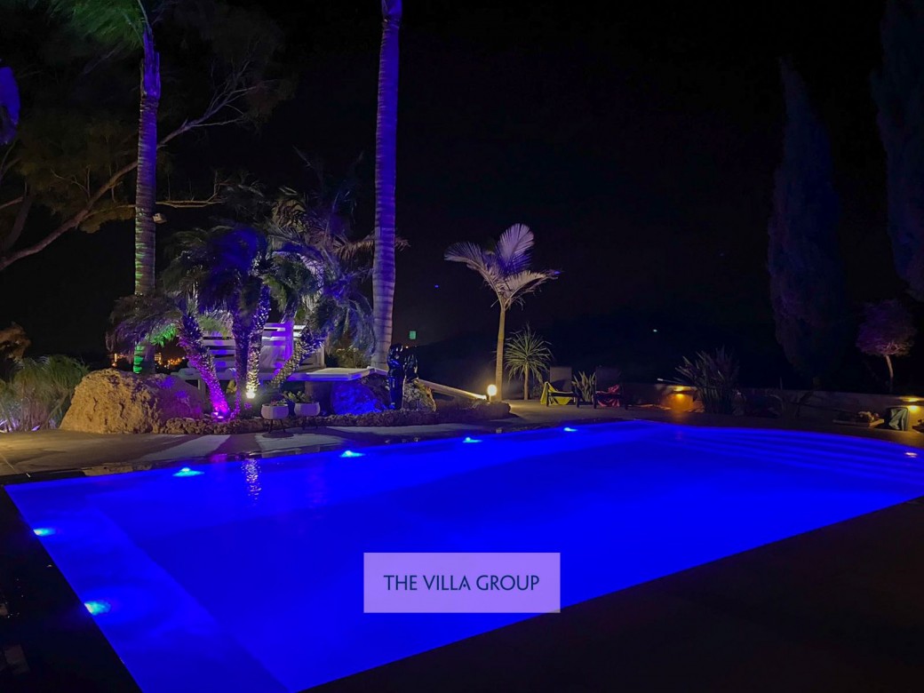 Swimming pool lit at night