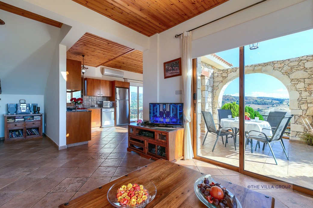Patio doors lead to the furnished balcony