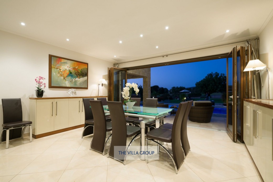 Dining room with full length concertina doors