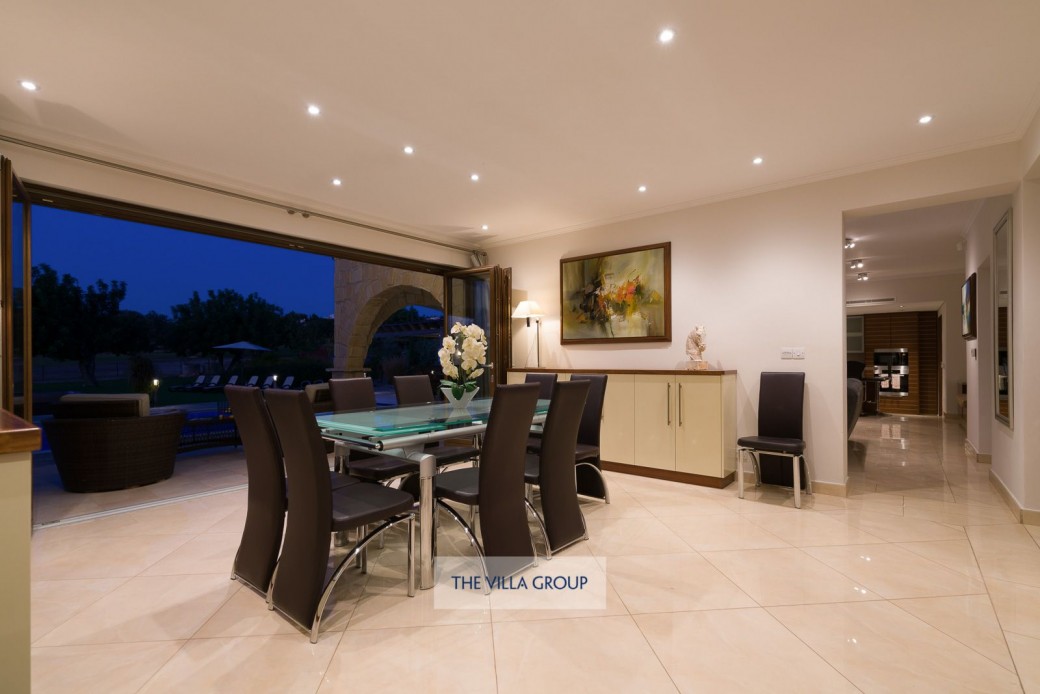 Dining room sits between the main living area and the first bedroom