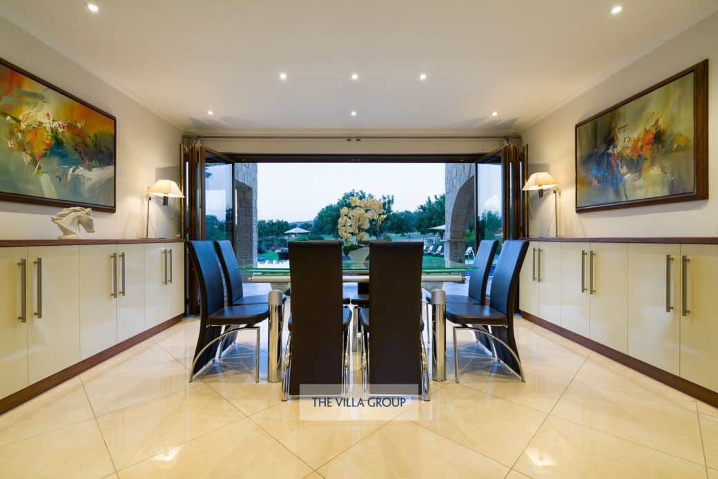 Dining room with full length concertina doors