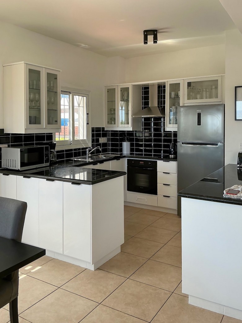 Open plan kitchen, living and dining areas