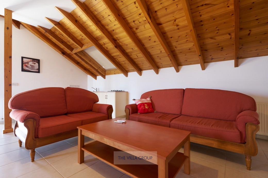 First floor spacious bedroom with sitting area and kitchenette