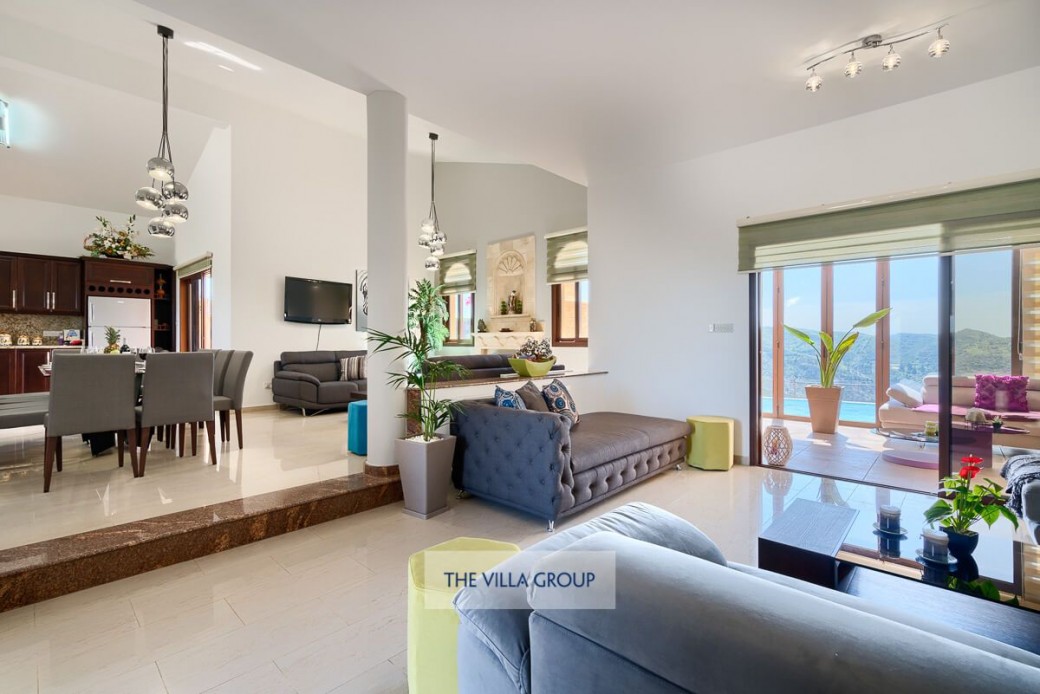 Open plan living, dining and kitchen areas