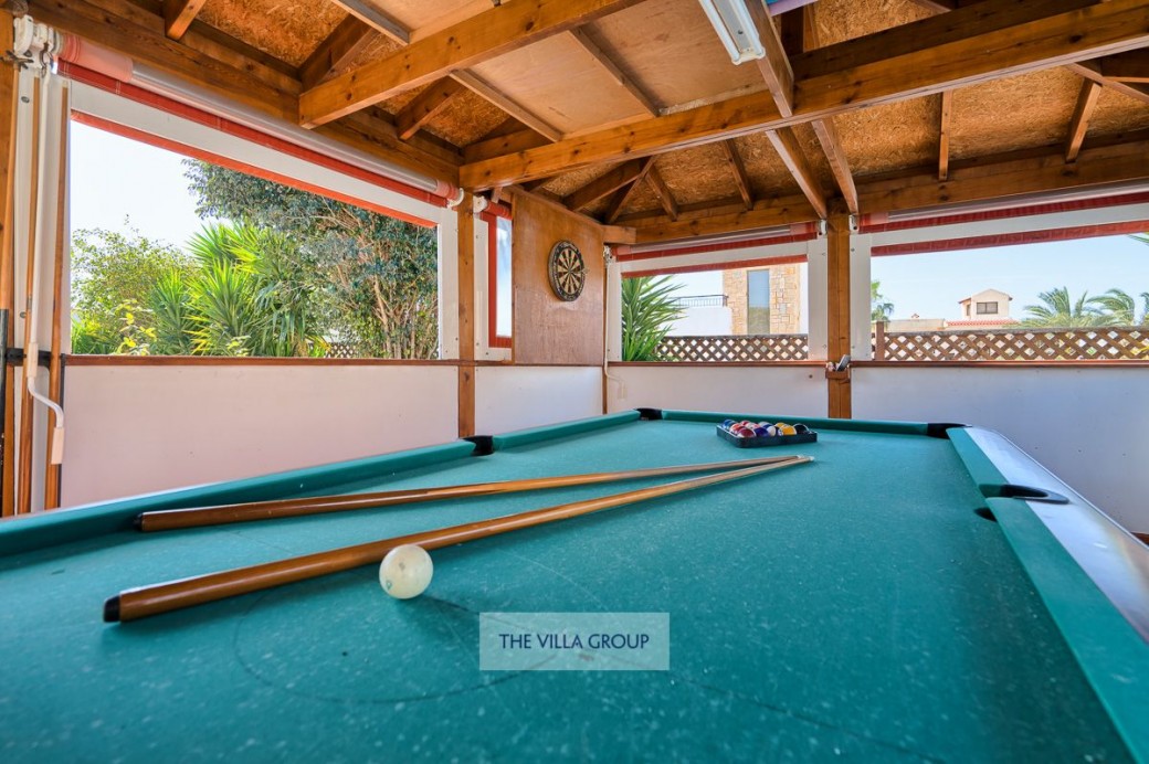 Games area with pool table and darts board