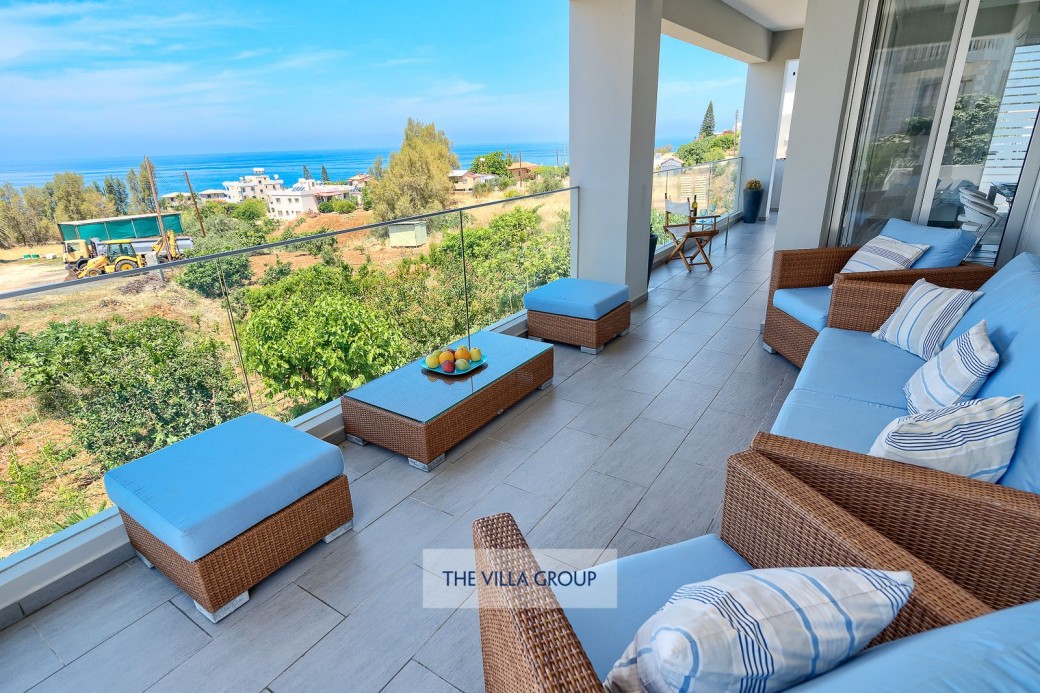 Full length terrace with plenty of outside furniture for relaxing and enjoying the stunning views