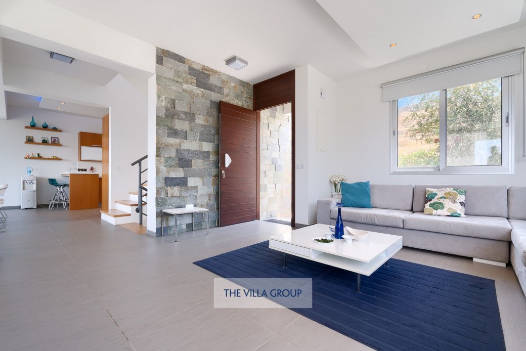 L shaped sofa, coffee table and TV with DVD player