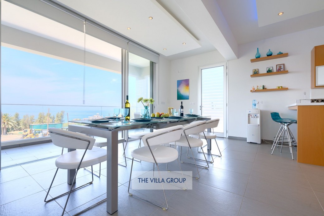 Dining area with views over the orchard and the Mediterranean Sea
