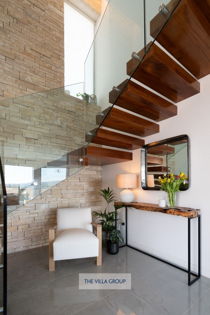 Stairs leading up to first floor