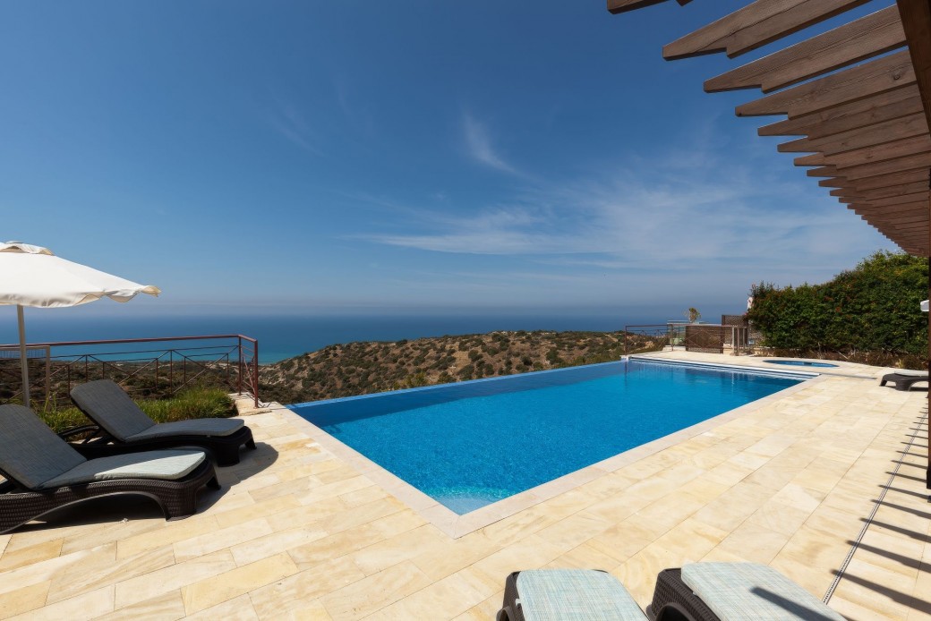 Comfy armchairs, sunbeds and tables also spread throughout the terrace