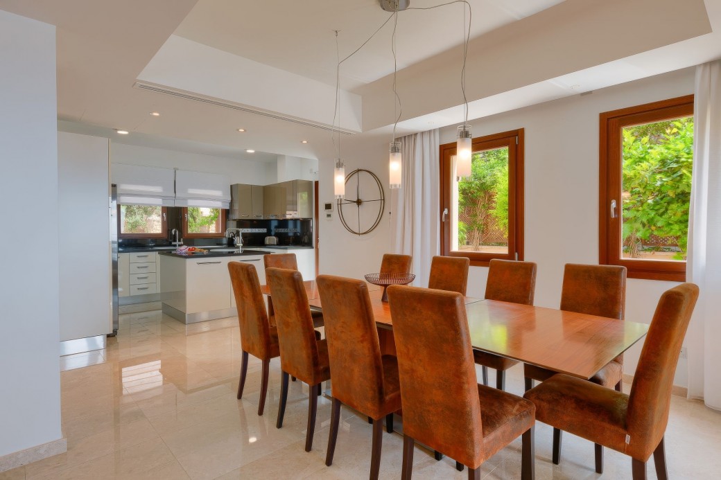 Hardwood dining table with 10 modern chairs 