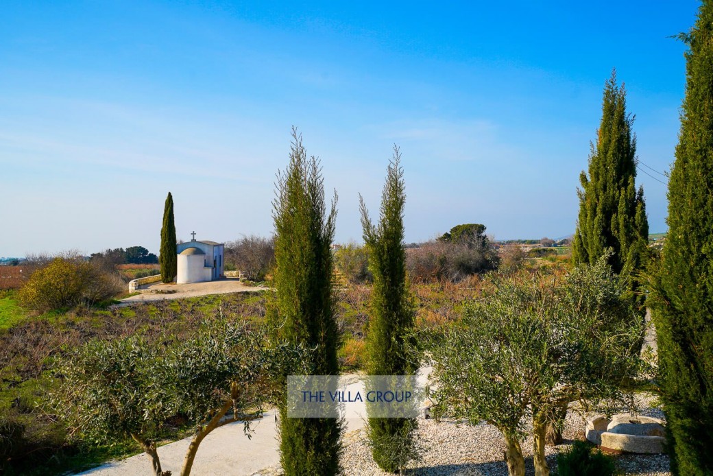 Open countryside and views down towards St Agia Marina Church