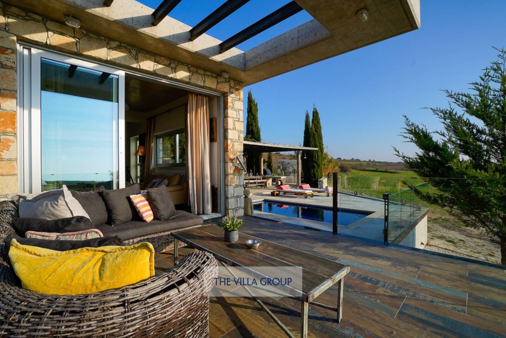 Patio doors from the living area lead to the outside area