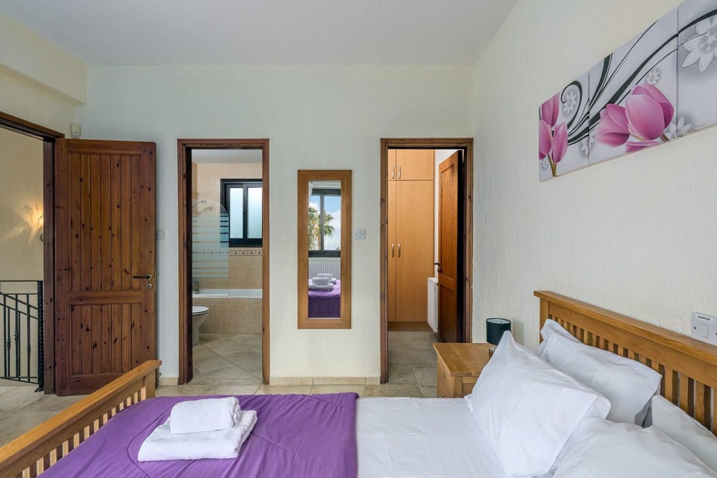 Master bedroom with walk-in wardrobe and en-suite