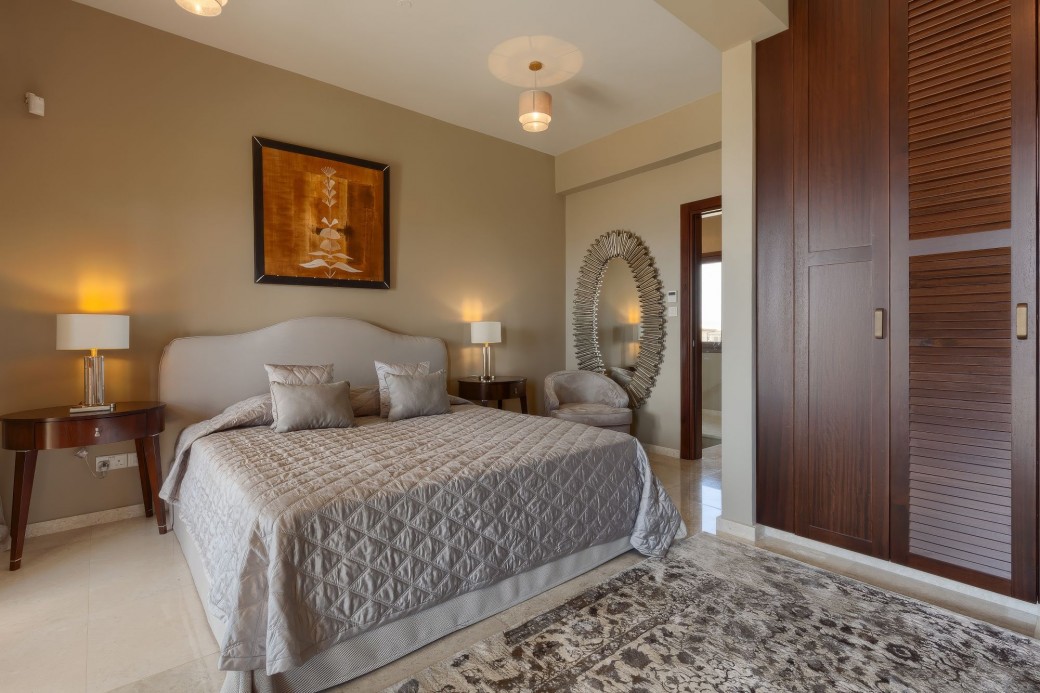 One bedroom on the ground floor, three bedrooms on the first floor and one bedroom on the lower ground floor