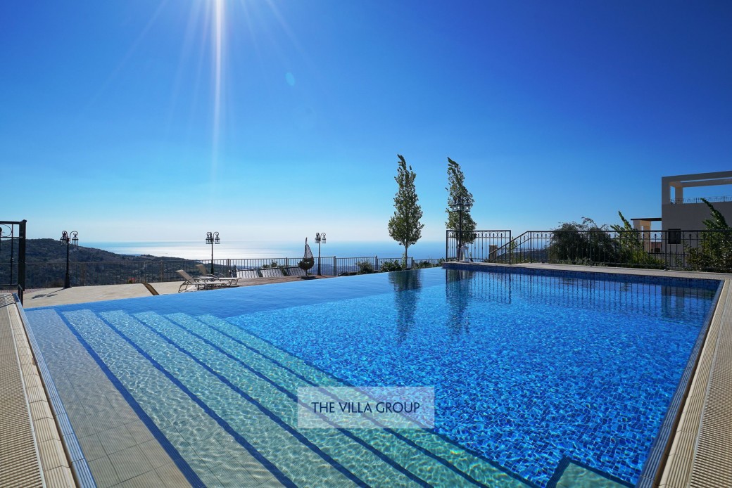 Infinity swimming pool with walk in steps