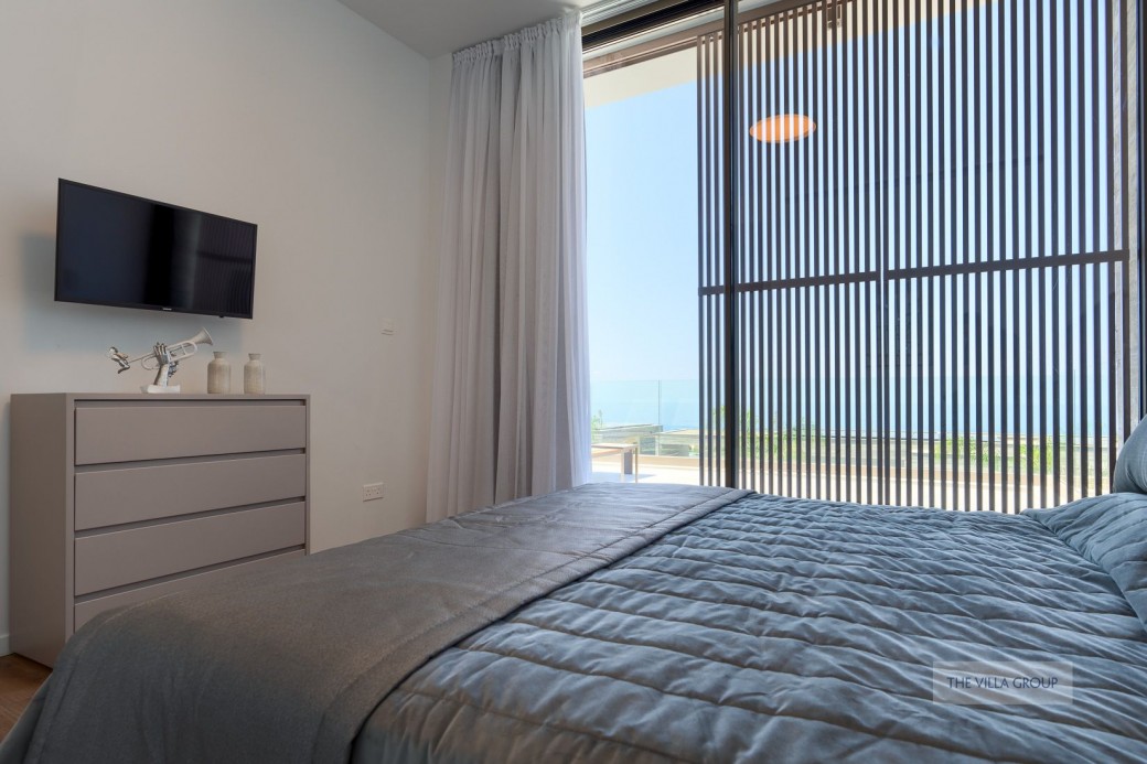 Patio doors to furnished terrace and swimming pool