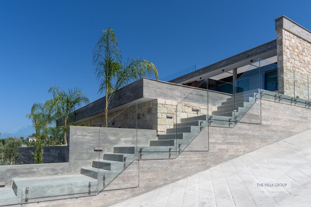 Stairs leading up to villa
