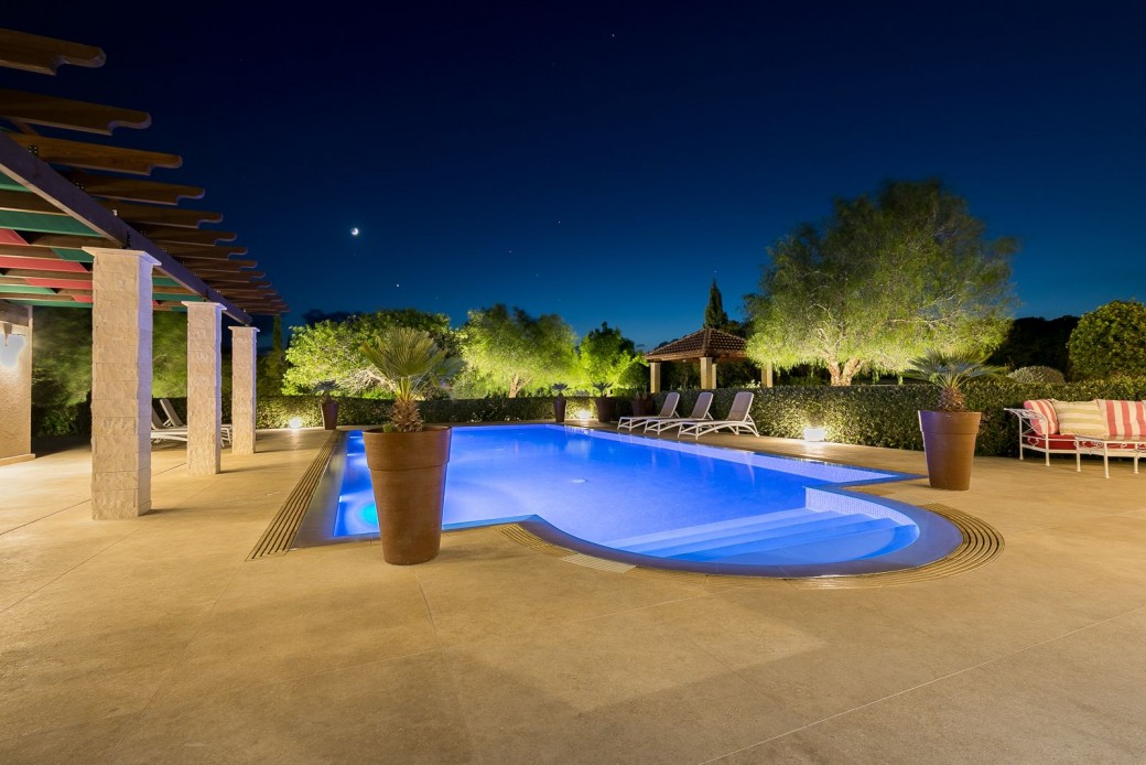 Swimming pool lit at night