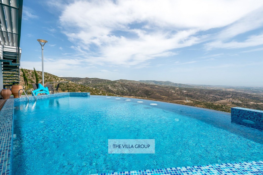 15m x 6m (at widest points, depth 1m to 2m) infinity pool 