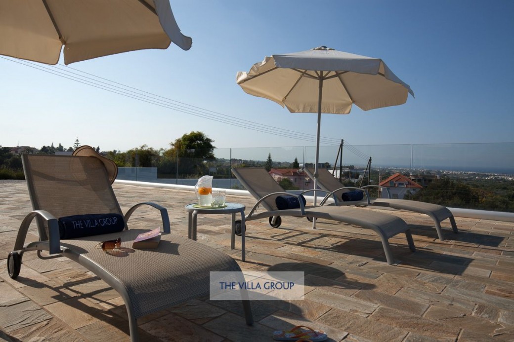 Plenty of sunbeds surround the pool